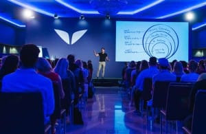 Vishen on stage presenting