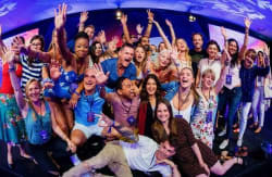 Mindvalley students and authors group photos on stage